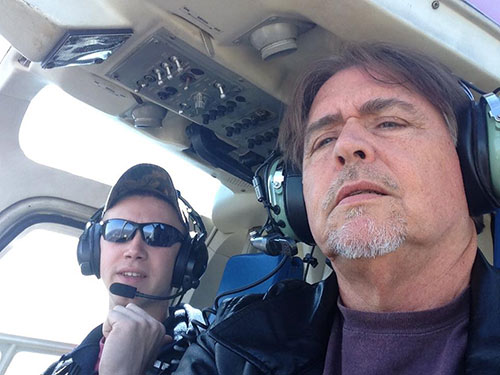 Helicopter pilot and AEF President, Al Cecere, investigate the safest route for helicopters to take so as not to disturb the nest.