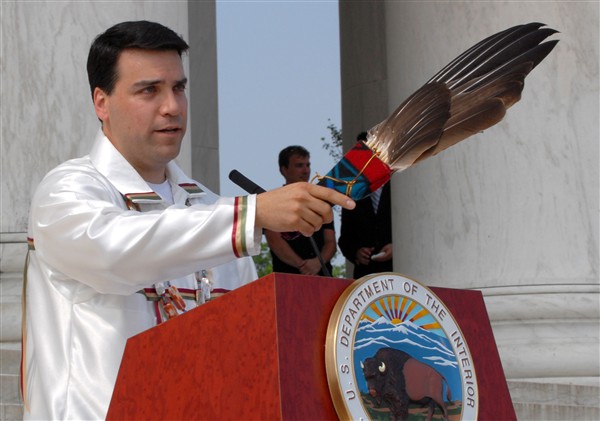 Scott Aiken of the Interior Department's Bureau of Indian Affairs performs a Native American blessing during the Bald Eagle Recovery and Final Delisting ceremony held June 28, 2007, at the Jefferson Memorial, Washington, D.C. Defense Dept. photo by Petty Officer 2nd Class Molly A. Burgess, USN